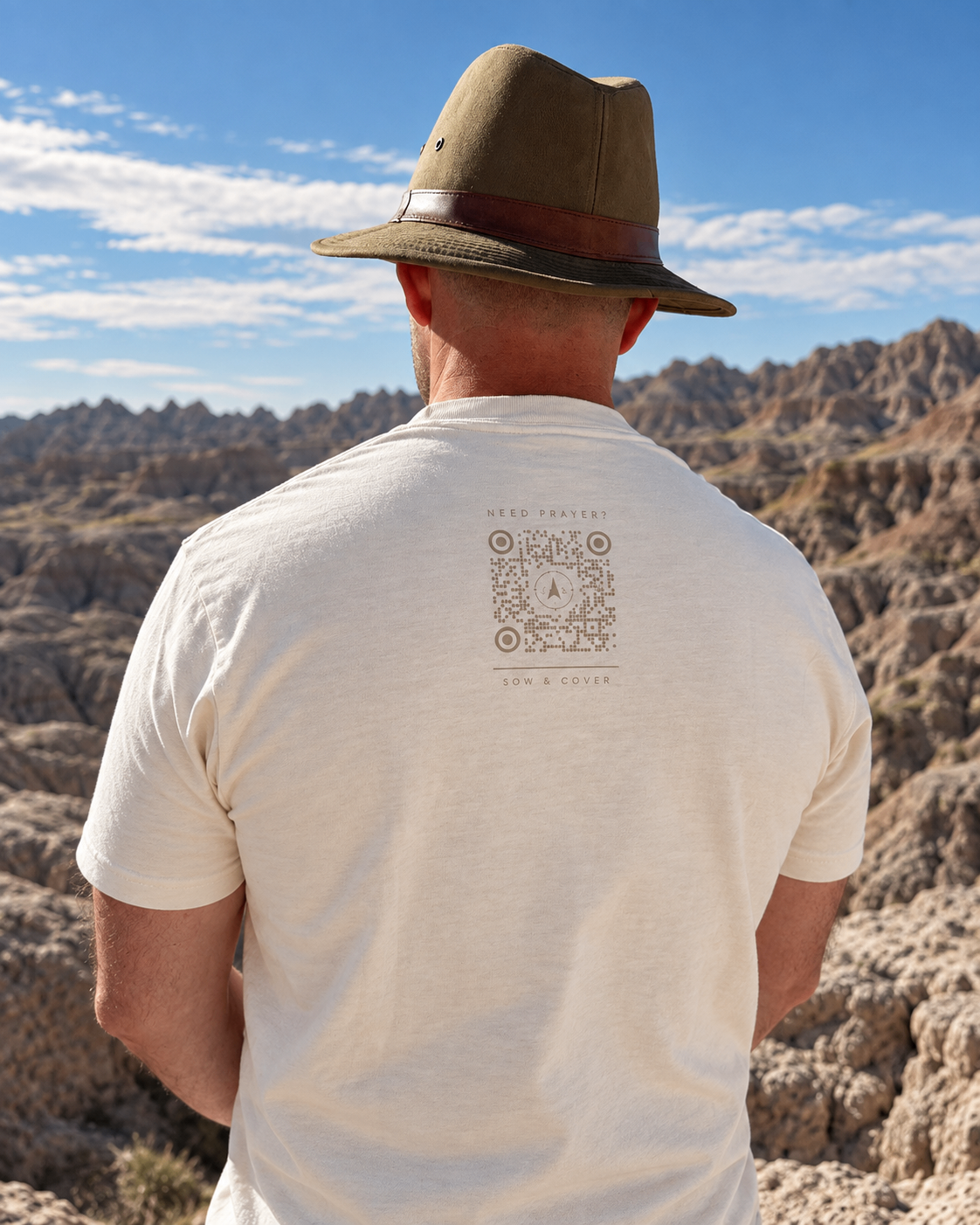 Back of the cream Commission Tee showing its QR detail
